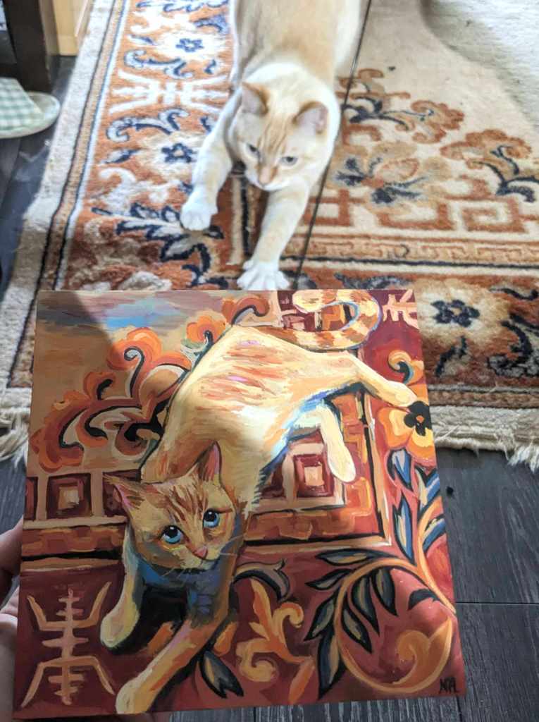 A photo of the painting’s subject, Kobe, with the final painting. 
